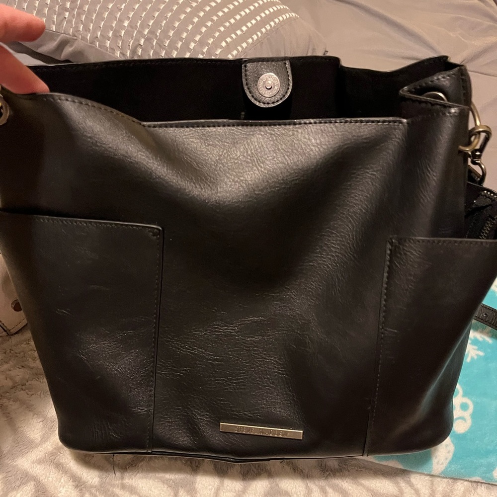 Black Steve Madden bag lots of room and pockets.